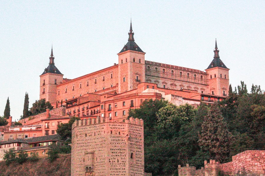 Afternoon light bathes the Alcázar of Toledo.