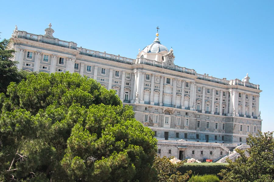 Blue skies at Madrid’s Royal Palace on a sunny day of our 2 week Spain itinerary.