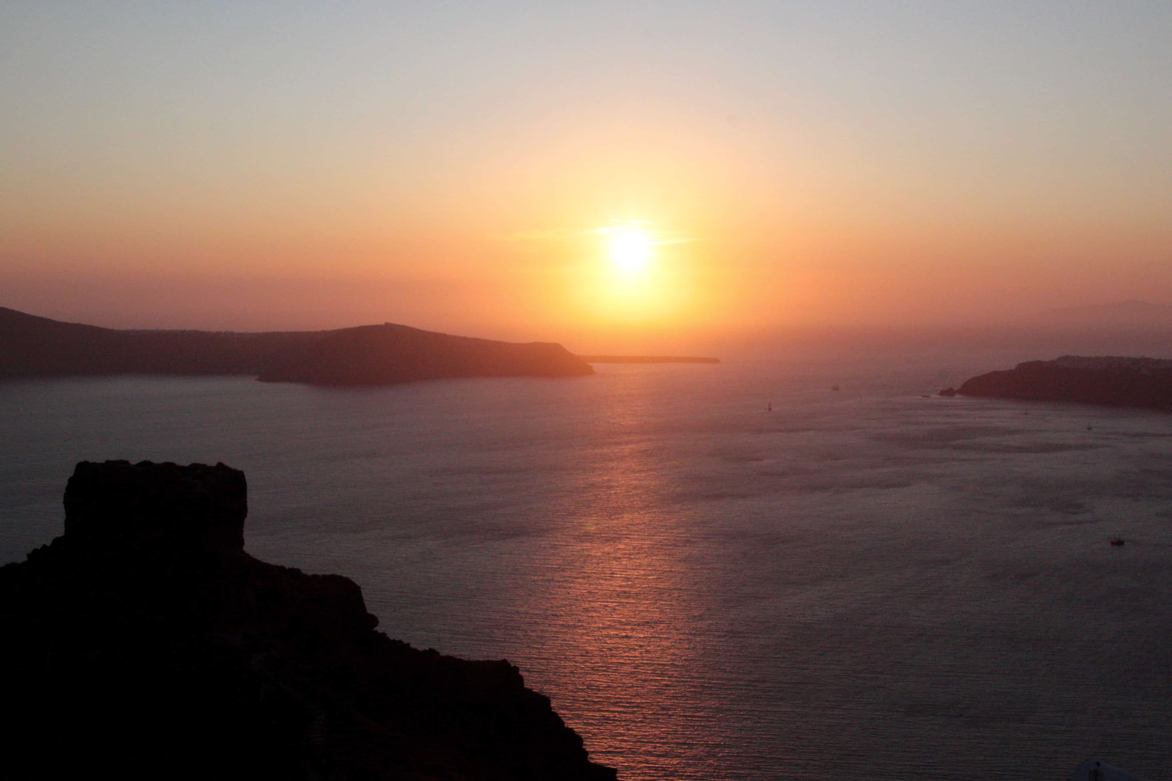 Sunset over the Mediterranean from the town of Imerovigli on the Greek island of Santorini.