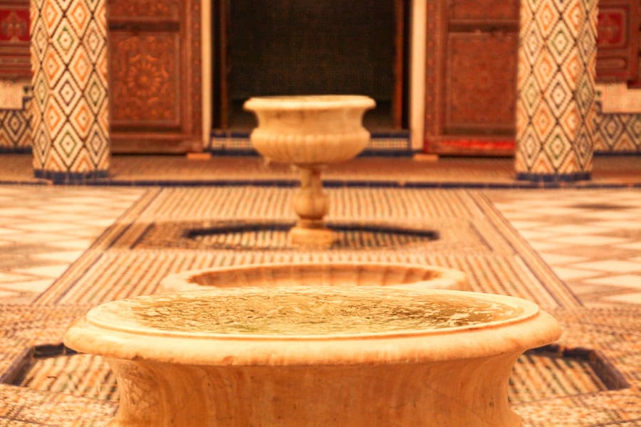 The courtyard of the Marrakech Museum with its intricate zellige tilework and fountains is a highlight of visiting Marrakech.