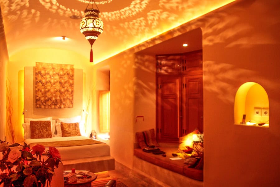 An ambiently lit room in a 5 star riad in the Medina of Marrakech