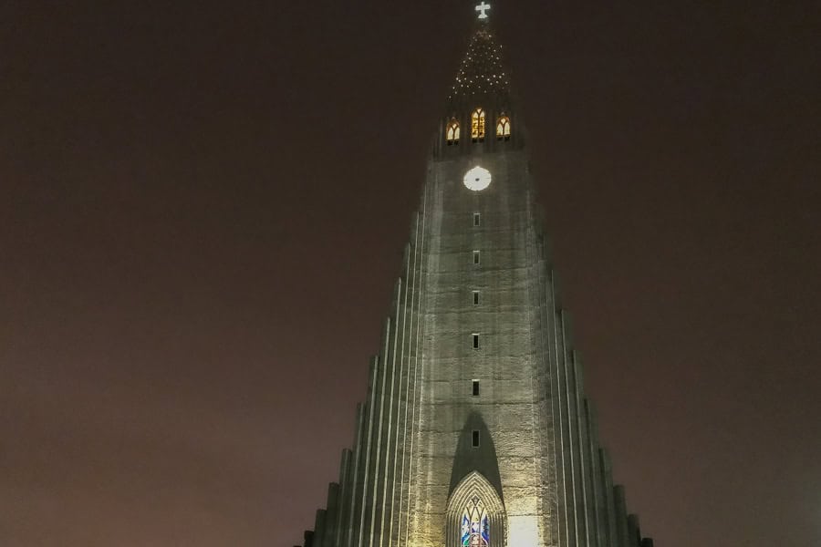 Hallgrímskirkja rises into the night sky in Reykjavik, first stop on our itinerary for Iceland.