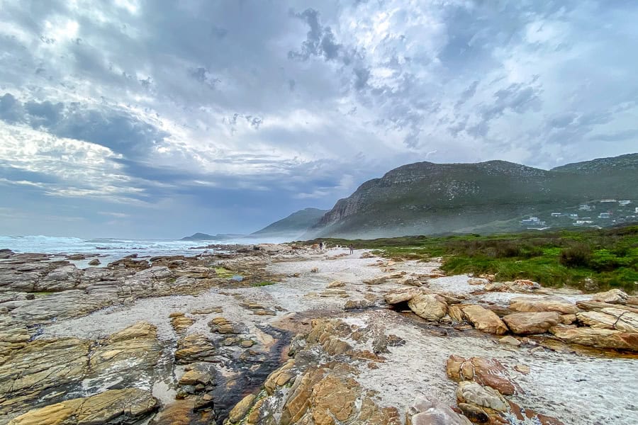 Dramatic misty views of the mountains from Scarborough Beach – a highlight of our 7 Day Cape Town Itinerary.