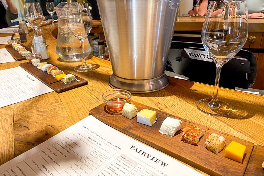 A platter of cheese waits for paired wine at Fairview in Paarl, one of the classic day tours from Cape Town to the Winelands.