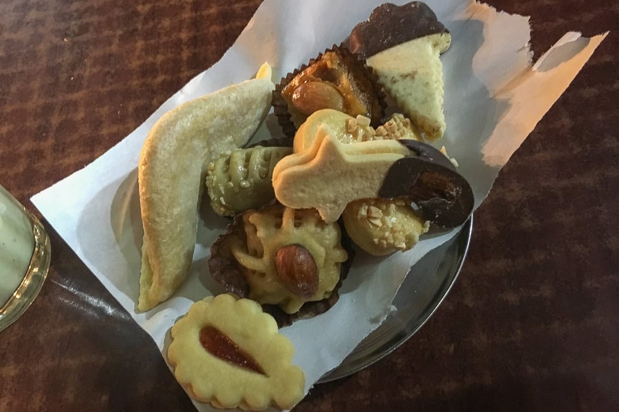 A plate of Moroccan cookies with creamy avocado and almond smoothies – what better way to end a Marrakech food tour.