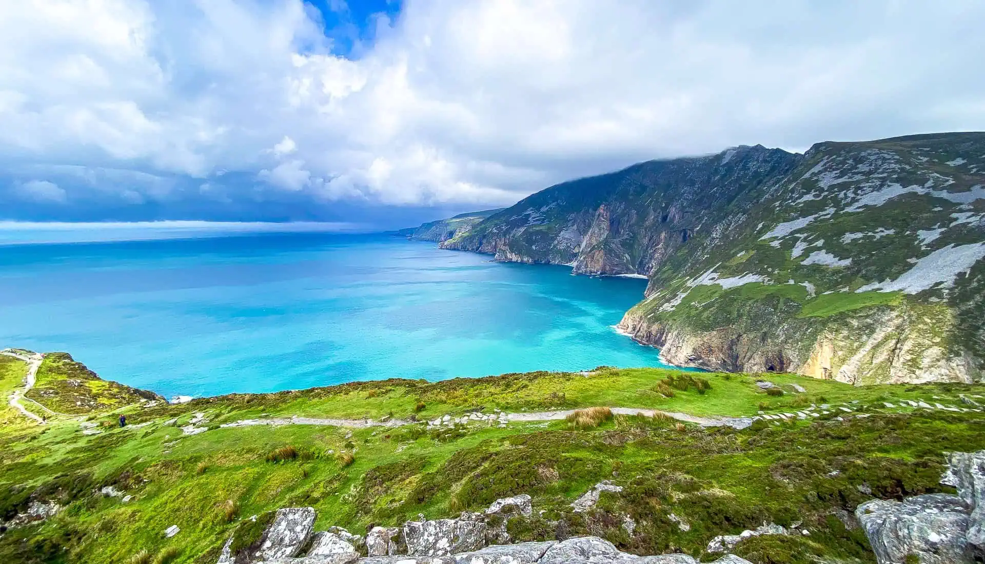 Dramatic views across turquoise water towards Sliabh Liag Cliffs, a key highlight in a Wild Atlantic Way road trip.